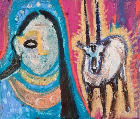 Woman next to an oryx.