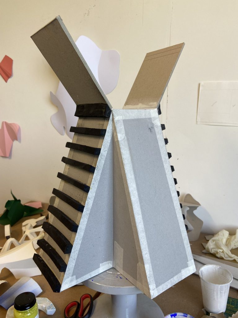 Mid build of architectural greyboard sculpture