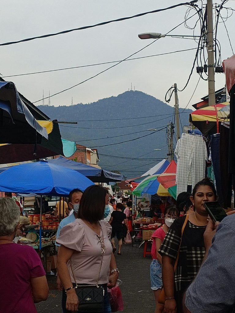 Morning market with a view of hill in the background